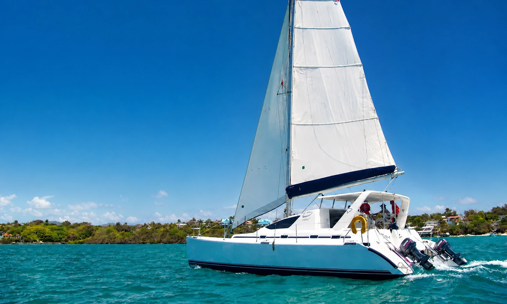 Aquacity catamaran sailing off the east coast of Mauritius